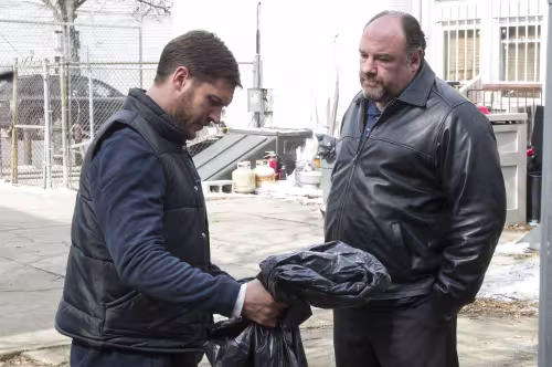 Tom Hardy as ÒBobÓ and James Gandolfini as ÒCousin MarvÓ in THE DROP. 

Photo by Barry Wetcher. 

Copyright © 2014 Twentieth Century Fox.